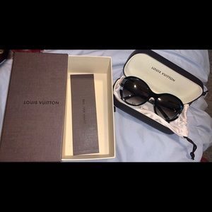 Louis Vuitton sun glasses.